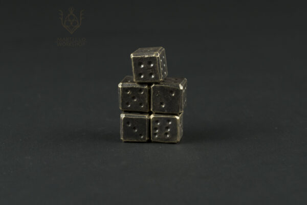 brass dice stacked